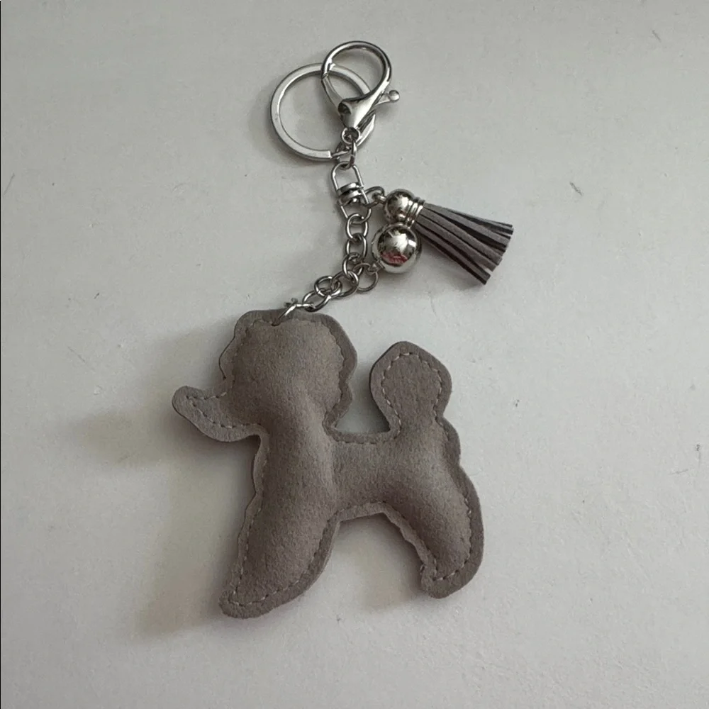 Stylish Gray Dog Keychain with Tassel